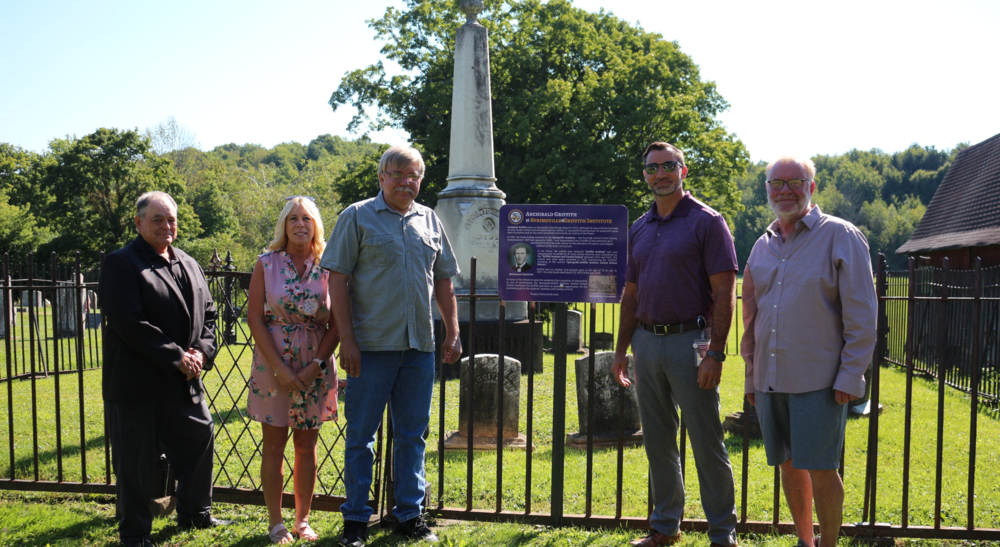 From left, Town of Concord council members Ken Zittle, Kimberly Krzemien, Town of Concord Supervisor Phil Drozd, James Bialasik, SGI superintendent, and Barry Edwards, Town of Concord Highway Supervisor, flank a new historical marker at East Concord Cemetery.