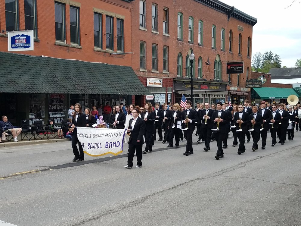 SGI band marches down Main Street.