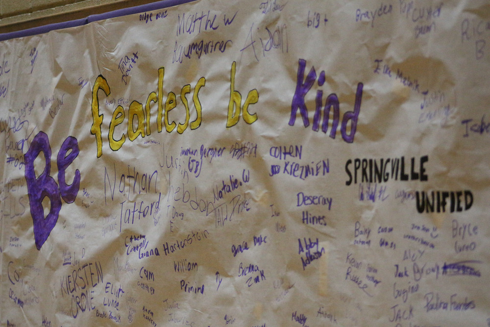 Signed banner with "Be Fearless, Be Kind" Springville Unified written amongst signatures. 