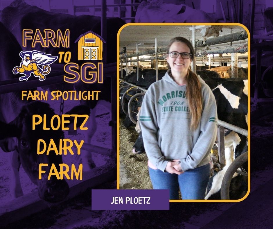 Jen Ploetz stands in front of cows from Ploetz Dairy Farm.