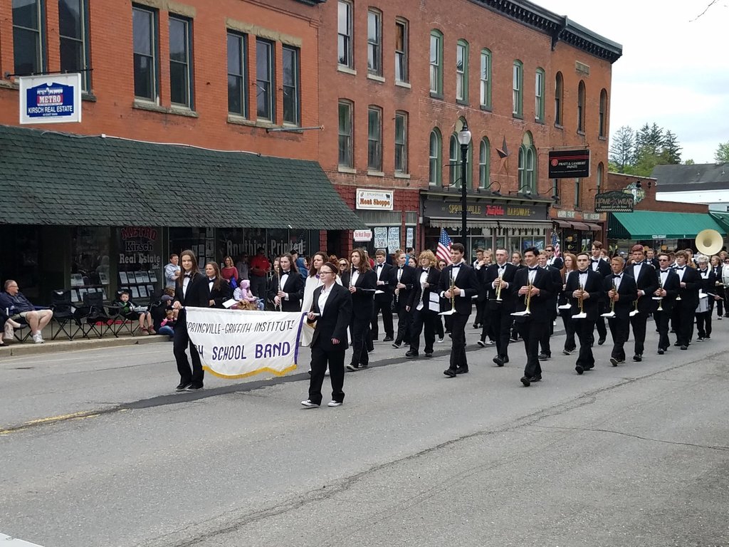 SGI band marching down Main Street.