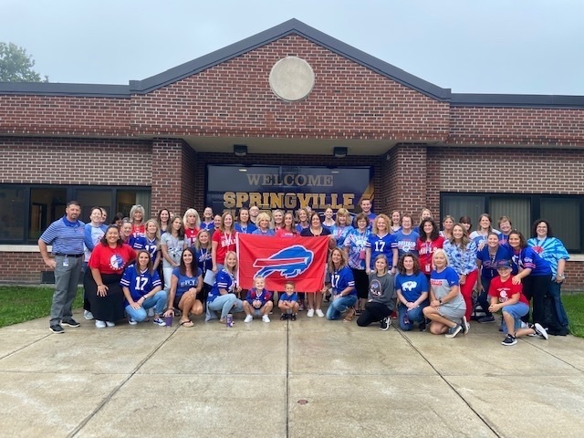 SES staff take a picture wearing Bills gear